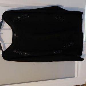 Woman's V Neck Size large Black Sweater with sequin accents. Made by a.n.a